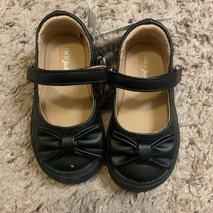 Black strap shoes